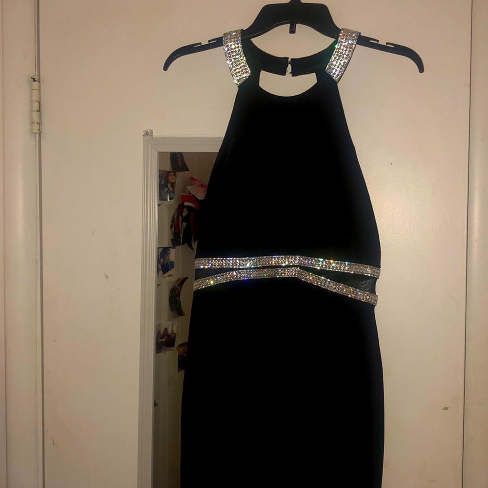 black long body con prom dress with a slit